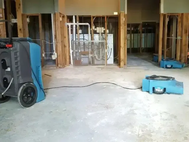LGR dehumidifier and air mover drying an opened room to the S500 goal